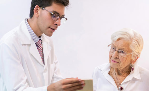 GP with elderly patient